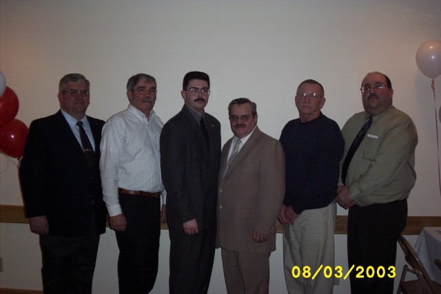 March 2003 - Annual Banquet - 25 Year Members with Chief Taylor (L to R) - FF James Corbett, Past Chief Robert Robar, Chief Taylor, Captain Robert Farnsworth, Sr., Secretary Al Grant, Past Chief Joe Gallagher