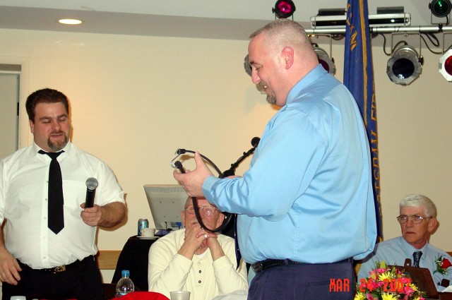 Ladies Night 2007 - Parishville Chief Jim Sullivan receiving a gift from Chief McGregor.