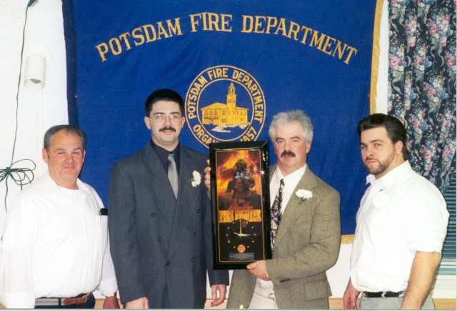 February 1999 - Chief John Keleher is presented a clock for his 3 years of service as Fire Chief