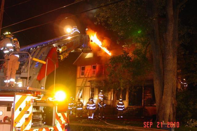 Tower 5 operating at a structure fire on Lawrence Avenue in September 2010.