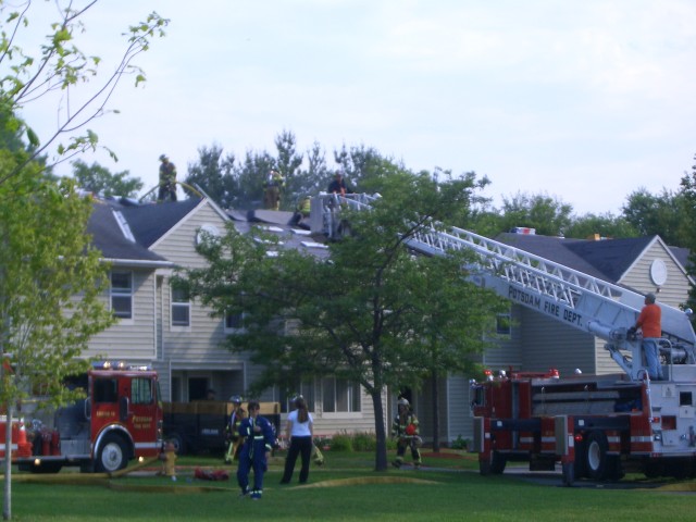 June 2005 - Firefighters operating at a structure fire in one of the Townhouse Apartment units on the Clarkson University Campus