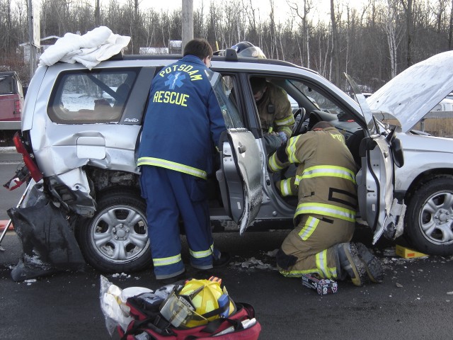 Two car MVA with injuries, Maple Street.