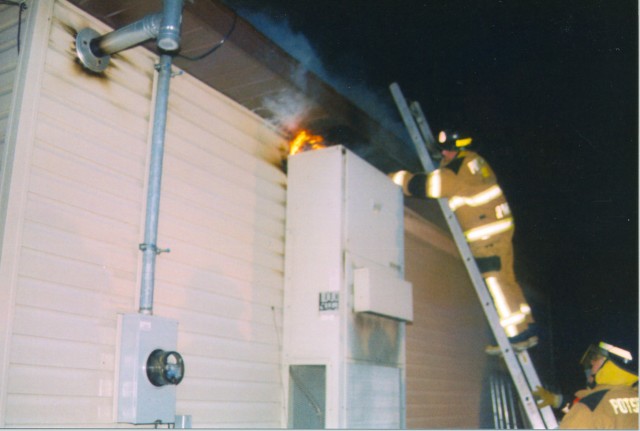 October 2003 - Fire showing rear of Todd's Mini Mart on SH 56 south