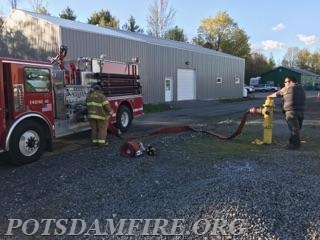 Training 5/15/2017-Firefighter William Enslow working on some driver re-cert training while Firefighter Justin McGregor works on some hydrant training