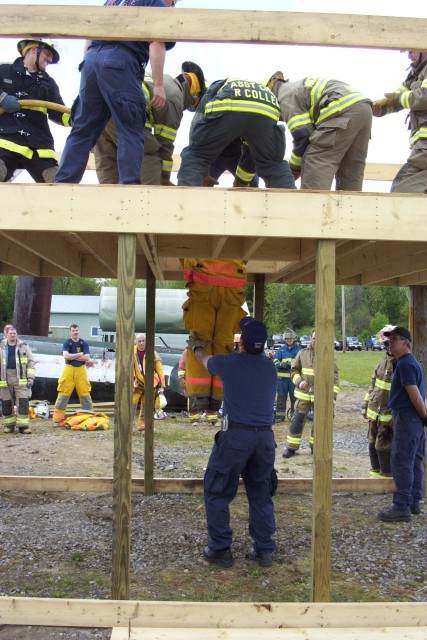 May 2005 - Firefighters practicing the &quot;Columbus Drill&quot; at the Mayday, Mayday- Firefighter Down training at the George E. Briggs Training Center In West Potsdam